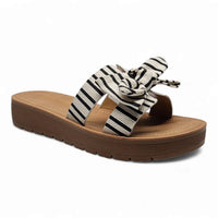 Susie Striped Linen Bow Slip On Sandals featuring a striped bow-adorned platform sandal