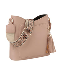 Blush pink leather T Pocket Crossbody Hobo Bag with decorative strap and tassel