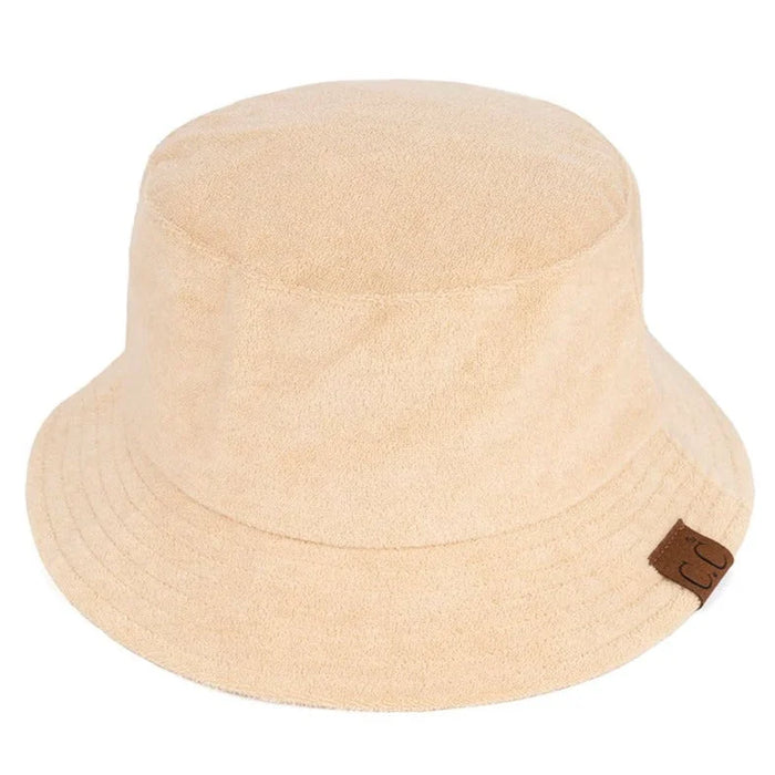 Beige Terry Cloth Bucket Hat with a small brown tag on the side