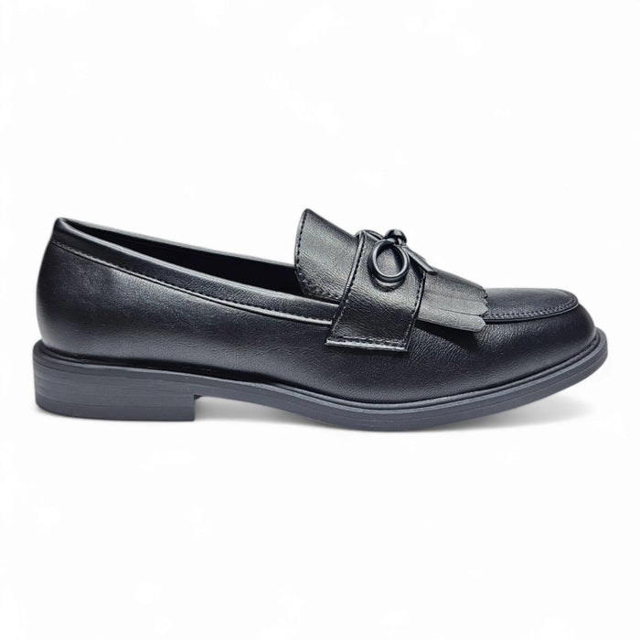 Black leather Toro Fringe Loafer featuring decorative strap and buckle detail