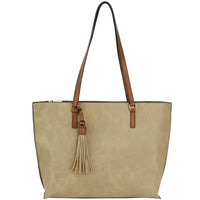 Beige leather tote bag with brown handles and tassel accent for stylish carry