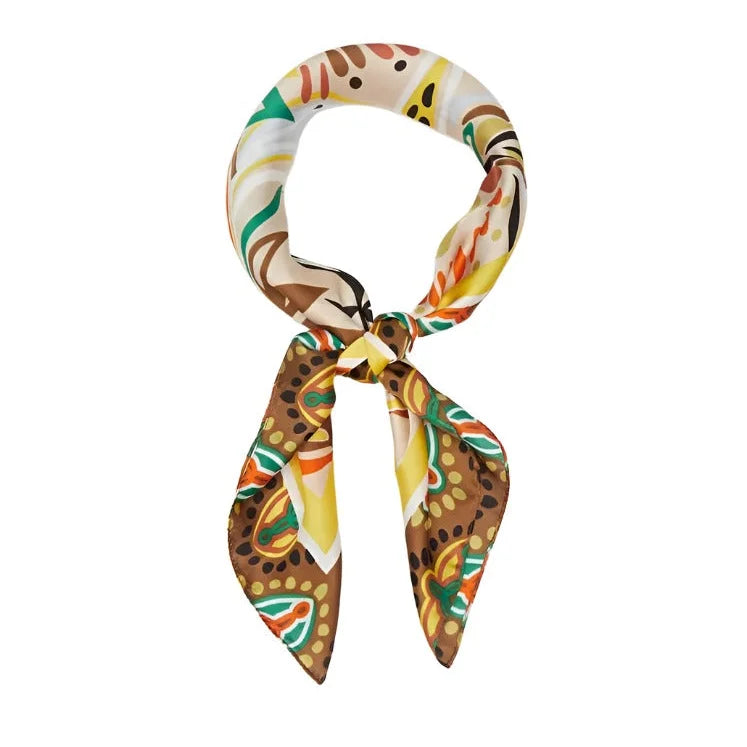 Colorful Tropical Leaves Scarf tied in a loop, showcasing vibrant patterns and texture