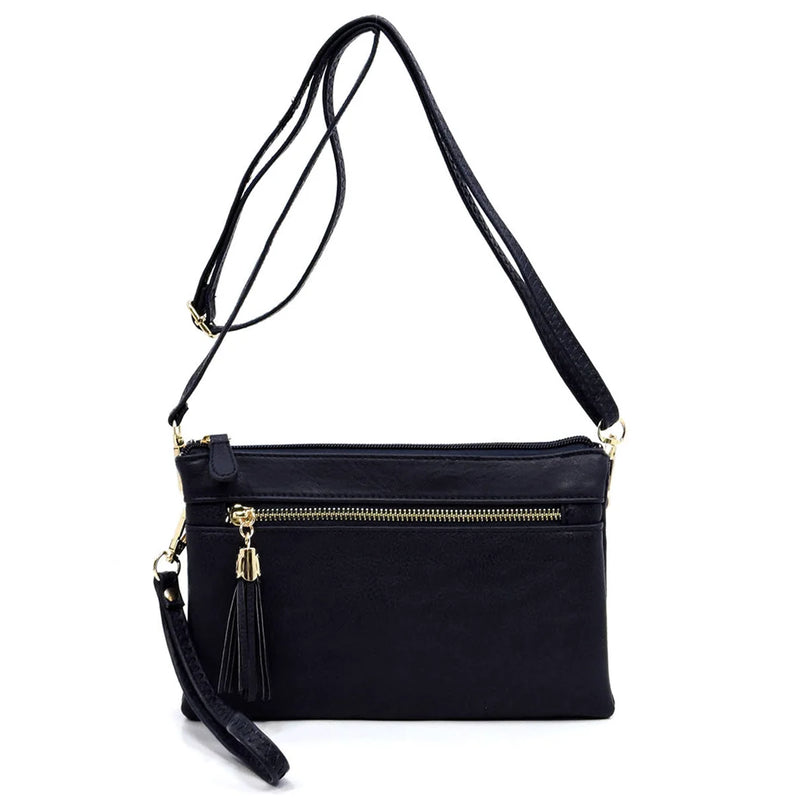 Black crossbody purse with zipper compartments and tassel detail for compartments messenger bag