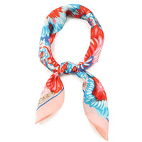 Colorful floral print silk scarf tied in a loop showcasing vibrant floral design