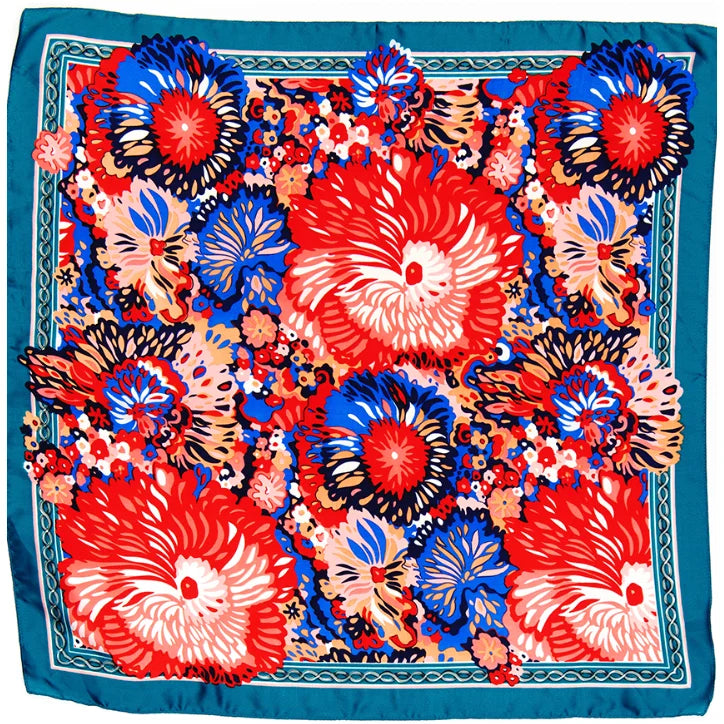 Vibrant Floral Print Scarf featuring colorful red, white, and blue floral patterns