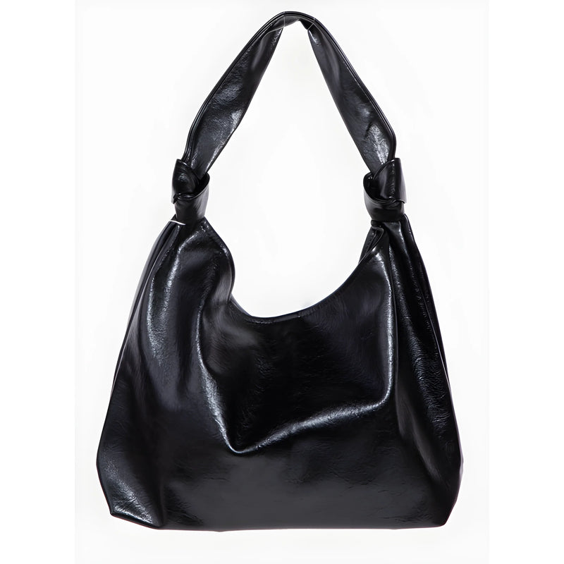 Black leather hobo bag with knotted straps in a Weathered Faux Leather Tote Bag design