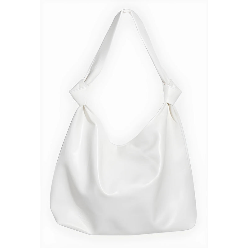 White slouchy hobo bag with long shoulder strap in weathered faux leather tote bag