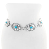 Silver bracelet with oval turquoise stones in floral concho designs for western style turquoise