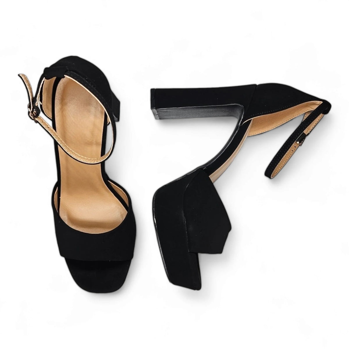 Pair of black high-heeled Vegas Pumps with ankle straps and chunky heels