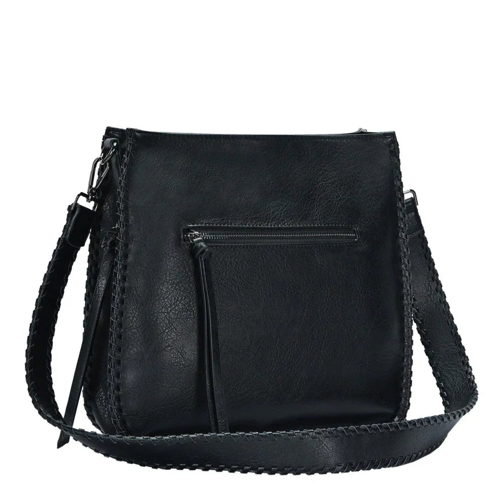 Black leather whipstitch crossbody bag with braided trim and front zipper pocket