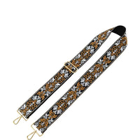 Floral patterned adjustable shoulder strap with gold-toned hardware for wide tribal pattern guitar