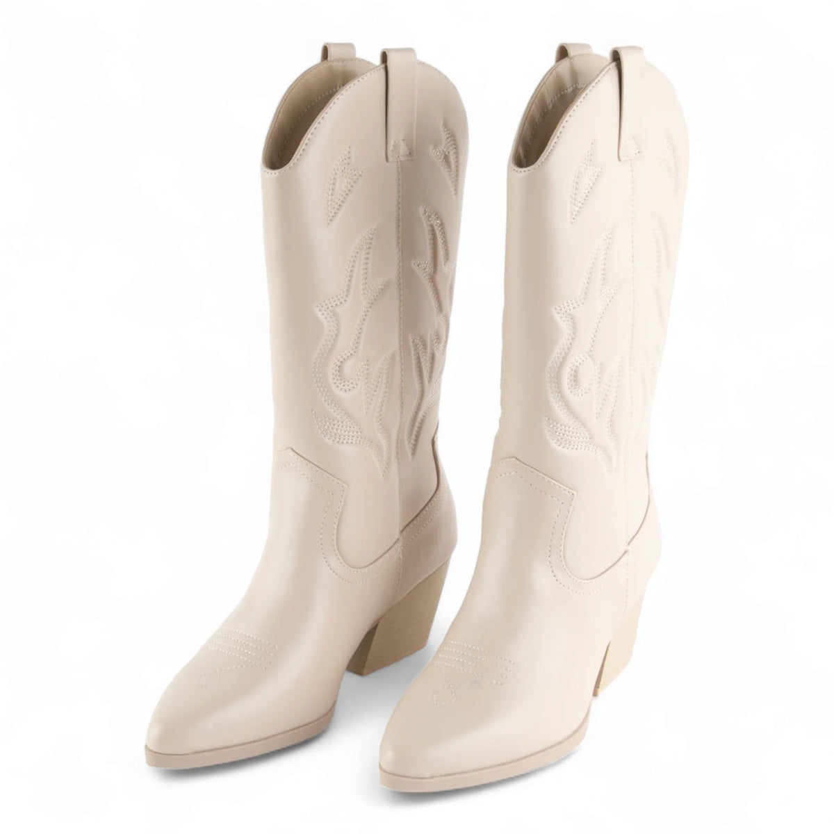 Cream-colored cowboy boots with pointed toes from the Wild West Wonder Boots collection