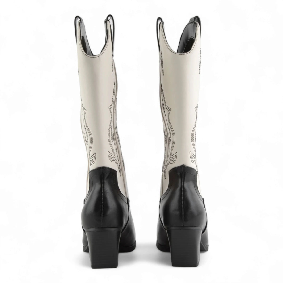 Wild West Wonder Boots, a pair of stylish white and black cowboy boots with chunky heels