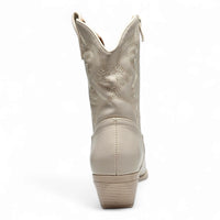 White leather cowboy boot with decorative stitching by Willa Wonka