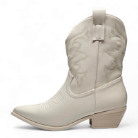 White leather cowboy boot with decorative stitching and pointed toe, Willa Wonka