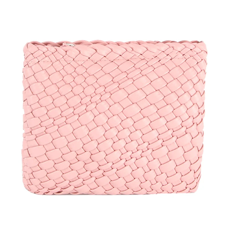 Pink woven clutch crossbody bag featuring an intricate basketweave pattern