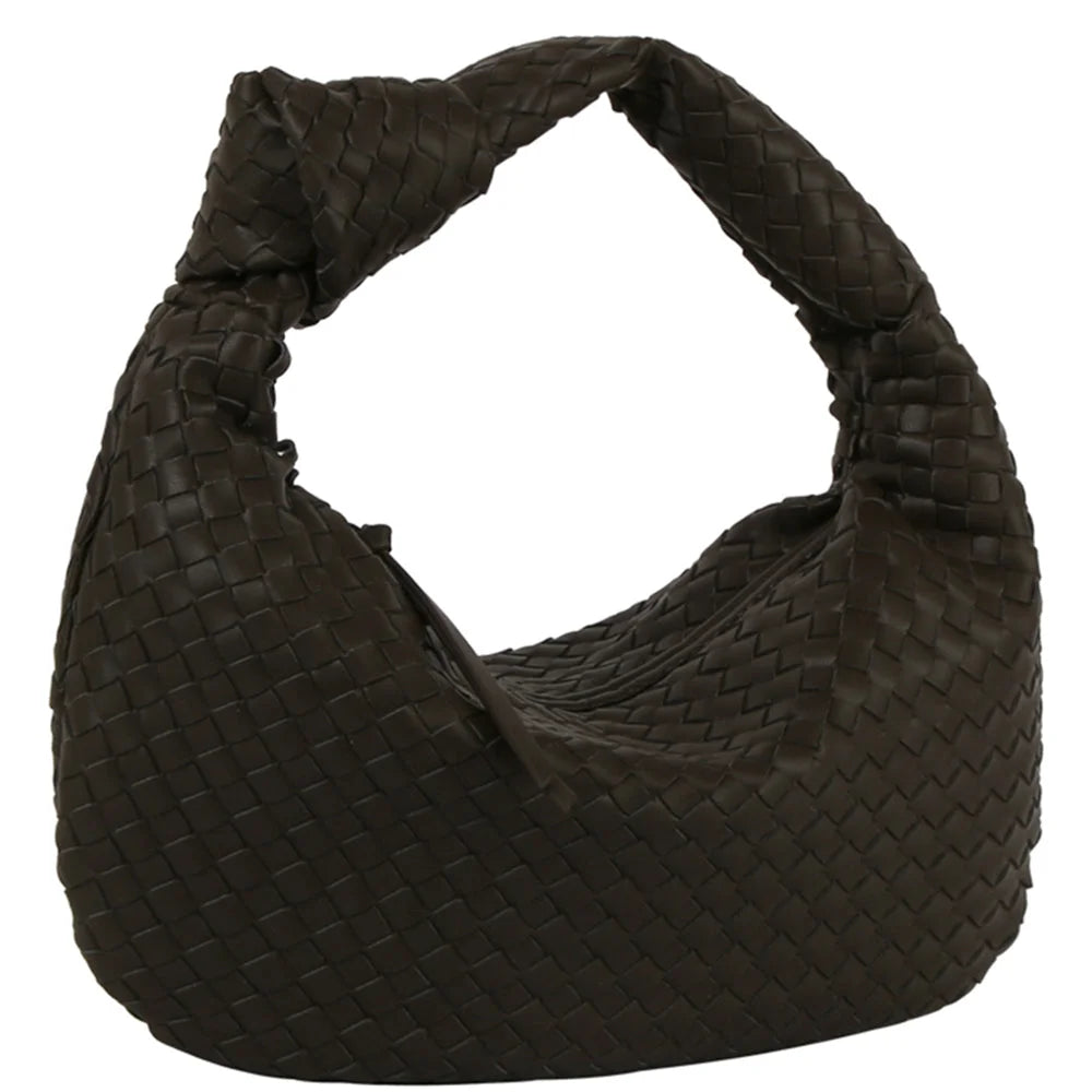 Black woven knotted hobo bag features a curved shoulder strap for stylish convenience