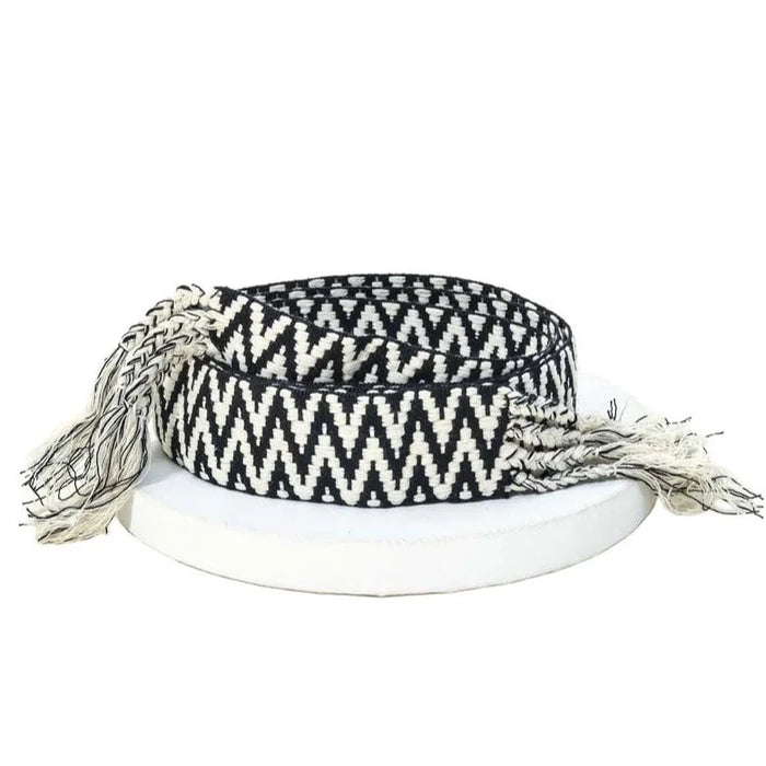 Black and white zig zag stripe pattern braided belt with fringed ends